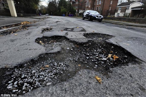 symptoms of a bad control arm