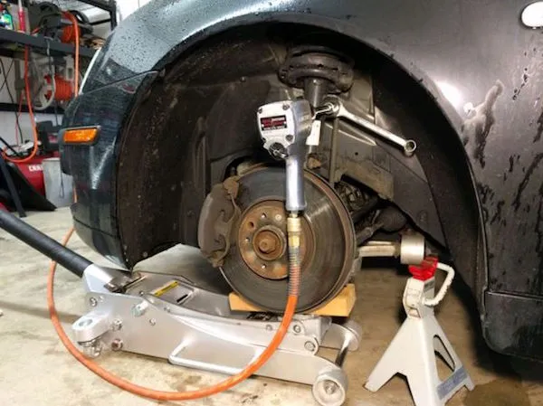 Removing Strut Assembly for Strut Mount Replacement Removing a complete strut assembly during strut mount replacement