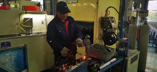 shock absorber manufacturing process welding inspection