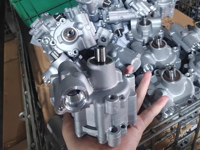 Final inspection of the finished power steering pump before packing