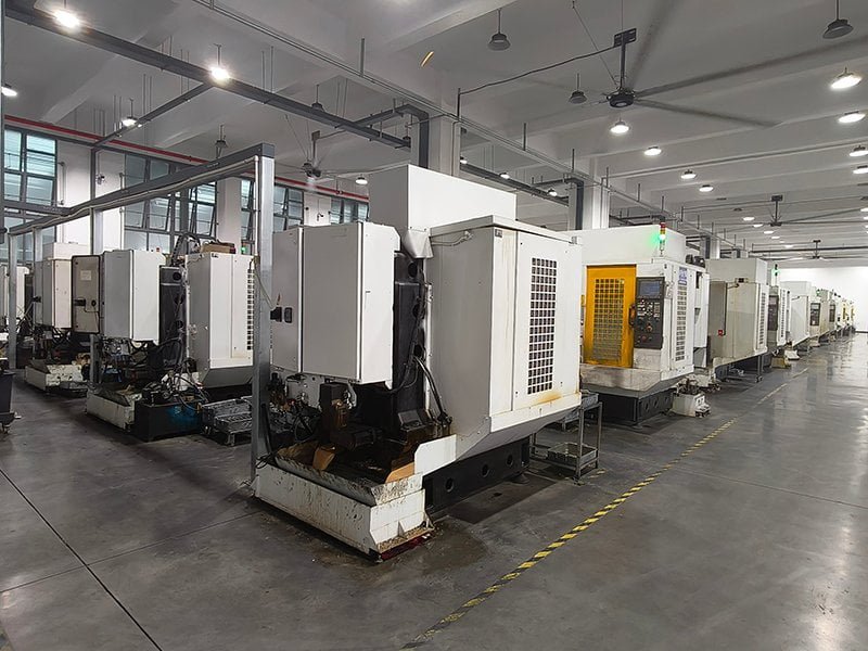 Interior of the GDST auto parts manufacturing factory with production lines and machinery